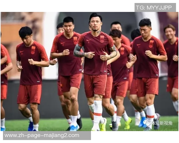 中国足球迎战关岛队全力争胜力争晋级亚洲杯预选赛决战时刻展现实力与团队精神